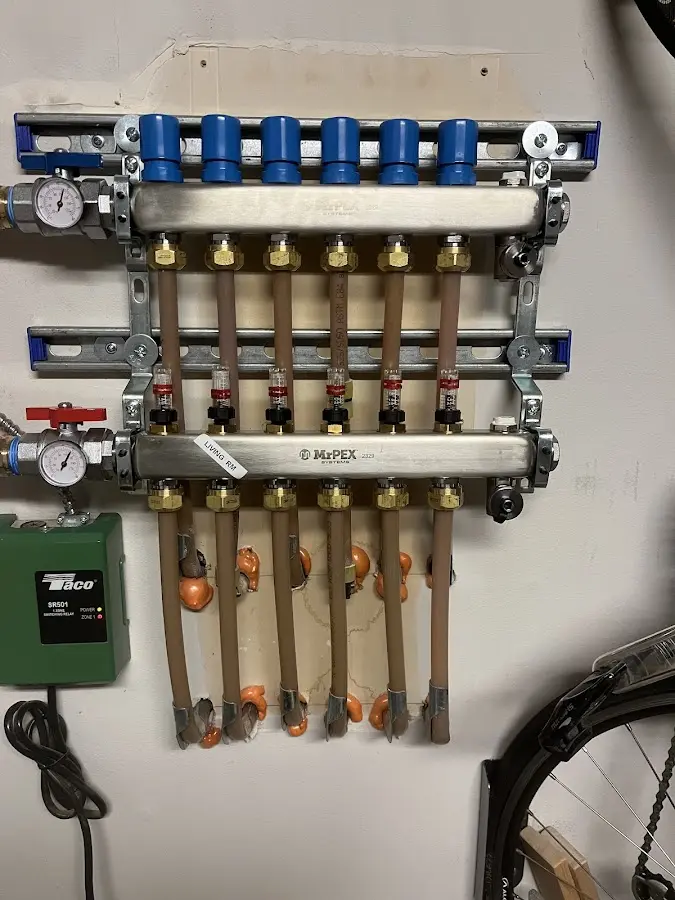 Plumber performing Gas Leak Detection at a residential property in Stonington